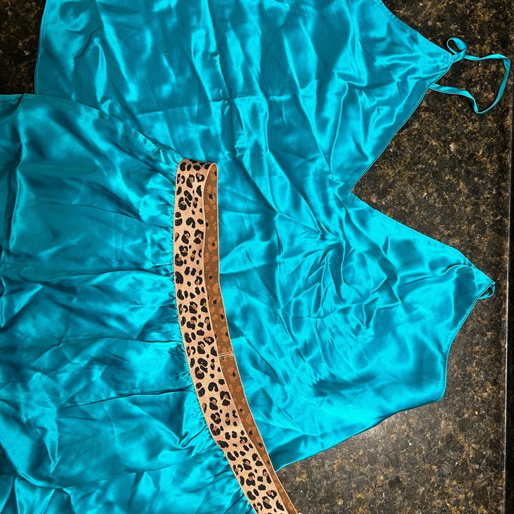 Two silk cami/shorts sets from Victoria’s Secret.